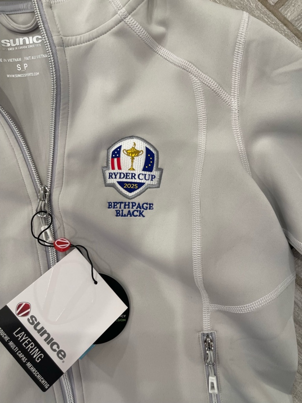 Sunice 2025 Ryder Cup Light Gray Women’s Hooded Jacket - Picture 2 of 4
